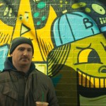 nickinfrontofmural